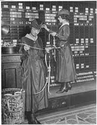 Girls Reading Ticker Tape