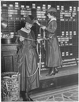 Girls Reading Ticker Tape